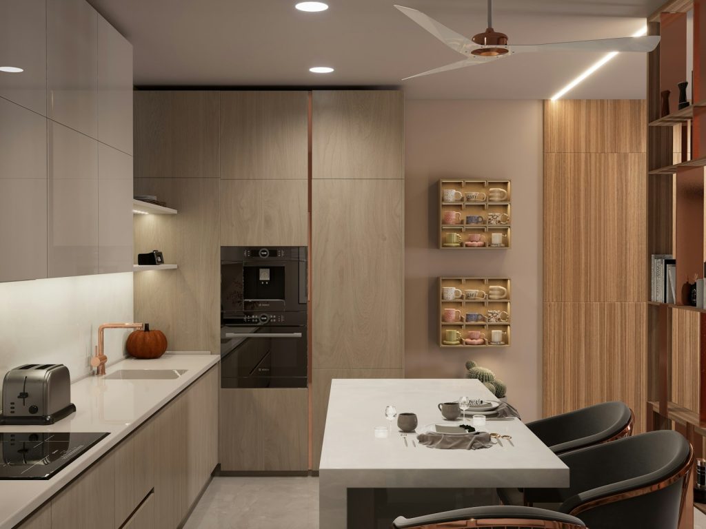 A modern kitchen with a small breakfast bar.